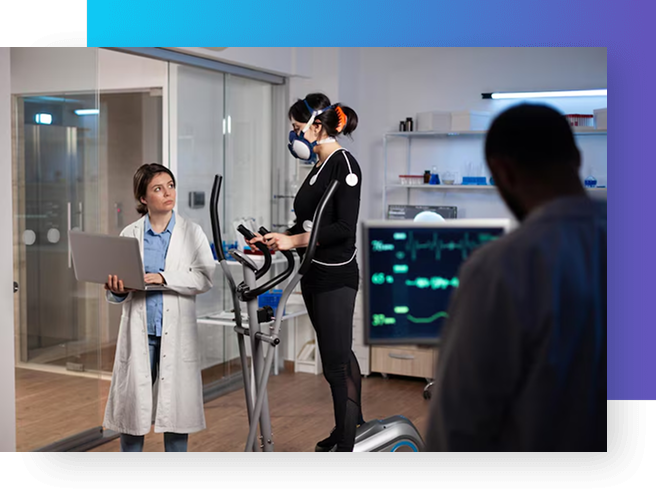 Woman in lab with trainer