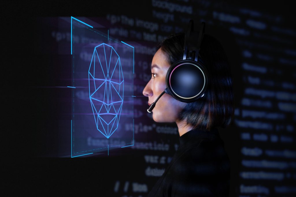 female-programmer-scanning-her-face-with-biometric-security-technology-virtual-screen-digital-remix