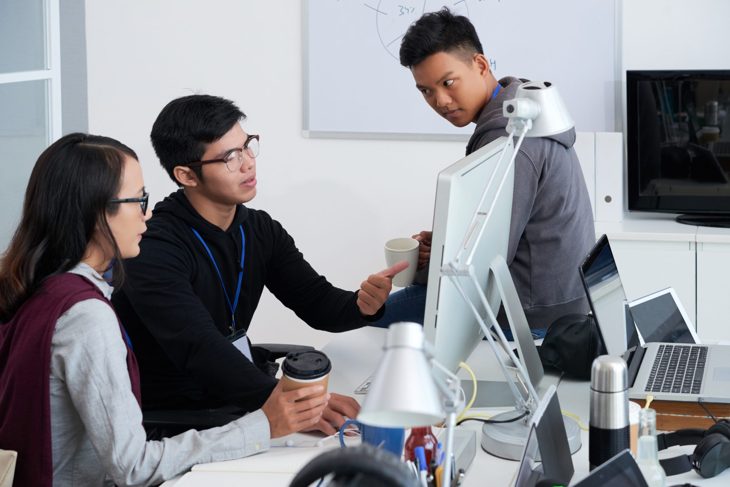 Professional developers discussing ideas for new project
