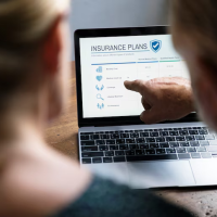 Person browsing insurance plans