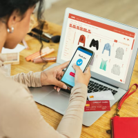 Woman shopping online with phone