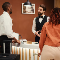 Hotel check-in with guests
